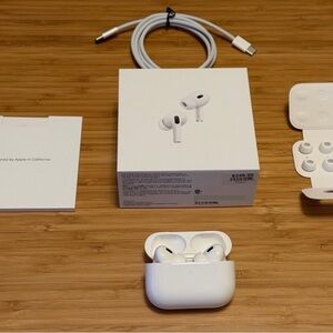 Apple AirPods Pro with White Charging Case and Accessories